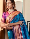 Blue Paithani Silk Saree which in itself is a masterpiece