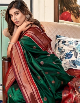 Dark Green Paithani Silk Saree which in itself is a masterpiece