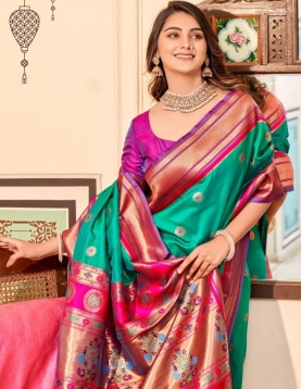 Turquiose Paithani Silk Saree which in itself is a masterpiece