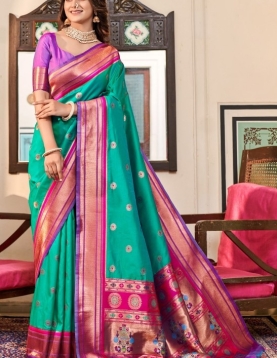 Turquiose Paithani Silk Saree which in itself is a masterpiece