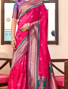 Rasberry Pink Paithani Silk Saree which in itself is a masterpiece