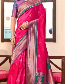Rasberry Pink Paithani Silk Saree which in itself is a masterpiece