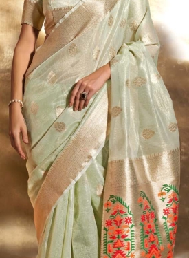 Pastel Green Paithani Zari Tissue Handwoven Saree, reflects its luxurious look in beautiful pastel colours