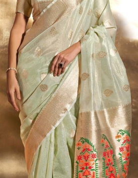 Pastel Green Paithani Zari Tissue Handwoven Saree, reflects its luxurious look in beautiful pastel colours